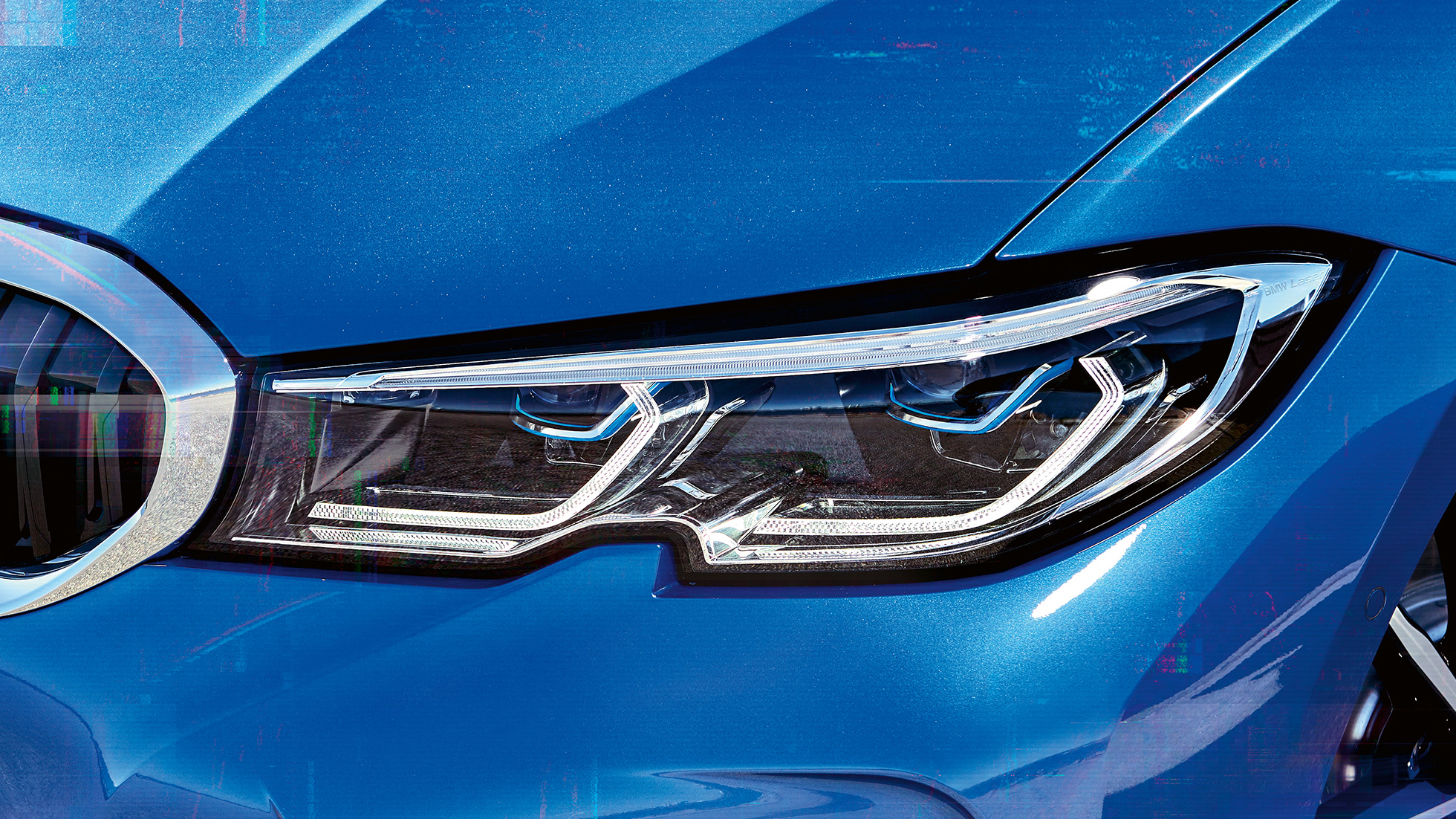 BMW Seria 3 Sedan cu farurile BMW Laserlight Imagine în prim-plan cu farurile BMW Laserlight din partea dreaptă a BMW Seria 3 Sedan