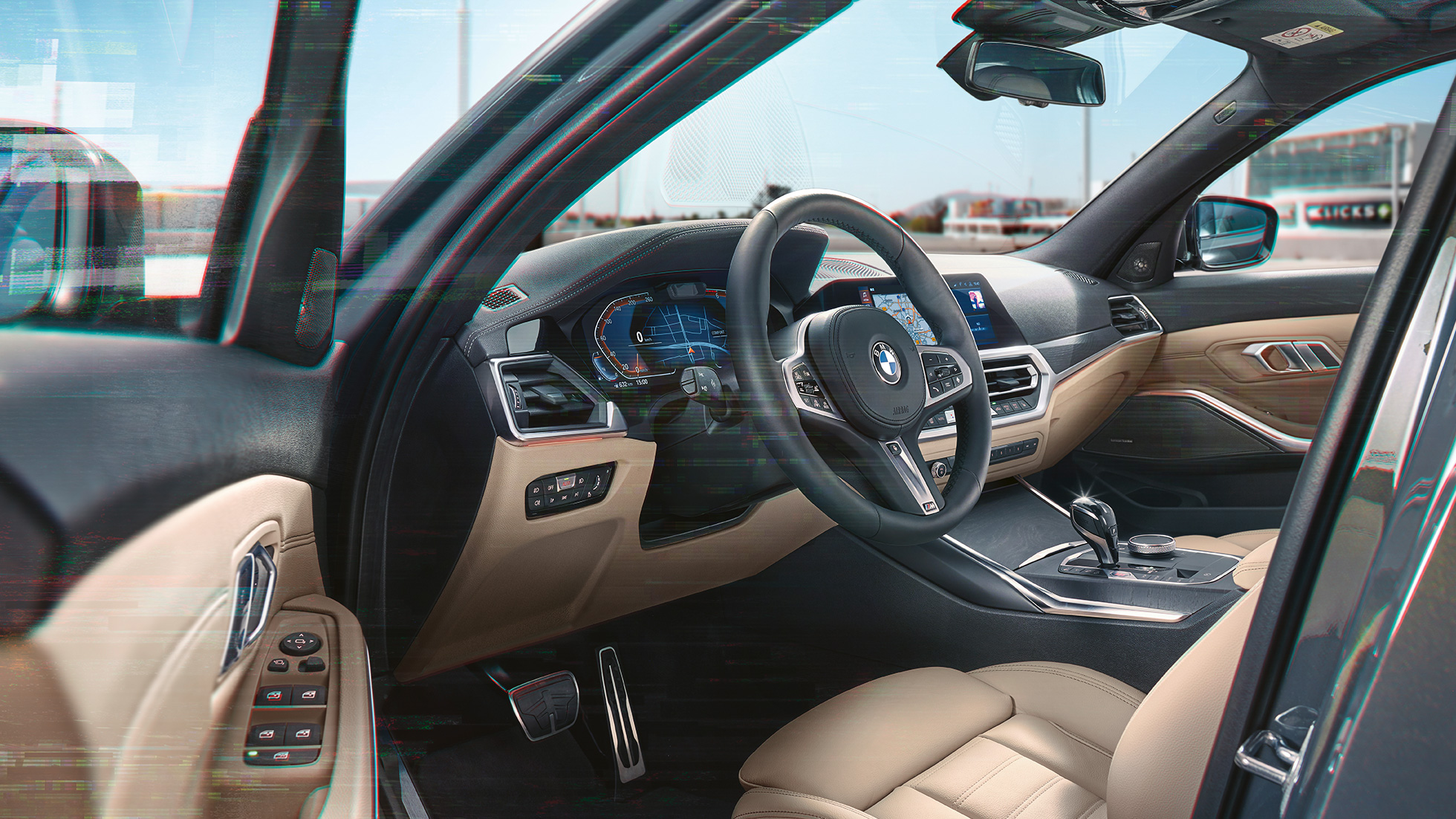 Imagine detaliată cu habitaclul BMW Seria 3 Touring Imagine detaliată cu habitaclul BMW Seria 3 Touring, în faţa unui peisaj urban
