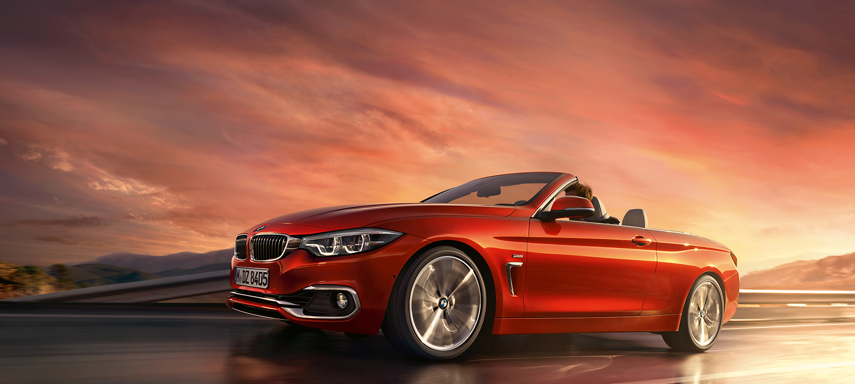 Imagine cu BMW Seria 4 Cabriolet rulând Imagine cu BMW Seria 4 Cabriolet rulând