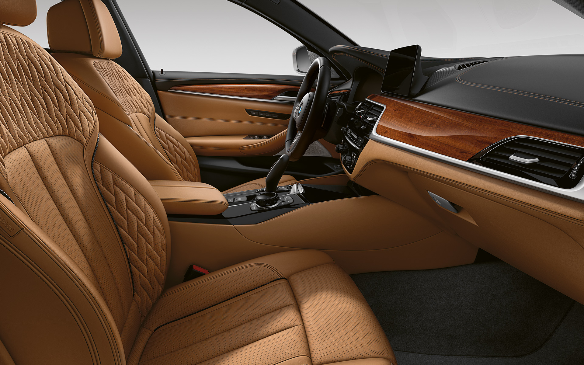 Imagine din interior a BMW Seria 5 Touring G31 LCI în piele integrală Merino BMW Individual | Caramel Imagine din interior a BMW Seria 5 Touring G31 2020 Facelift în piele integrală Merino BMW Individual | Caramel