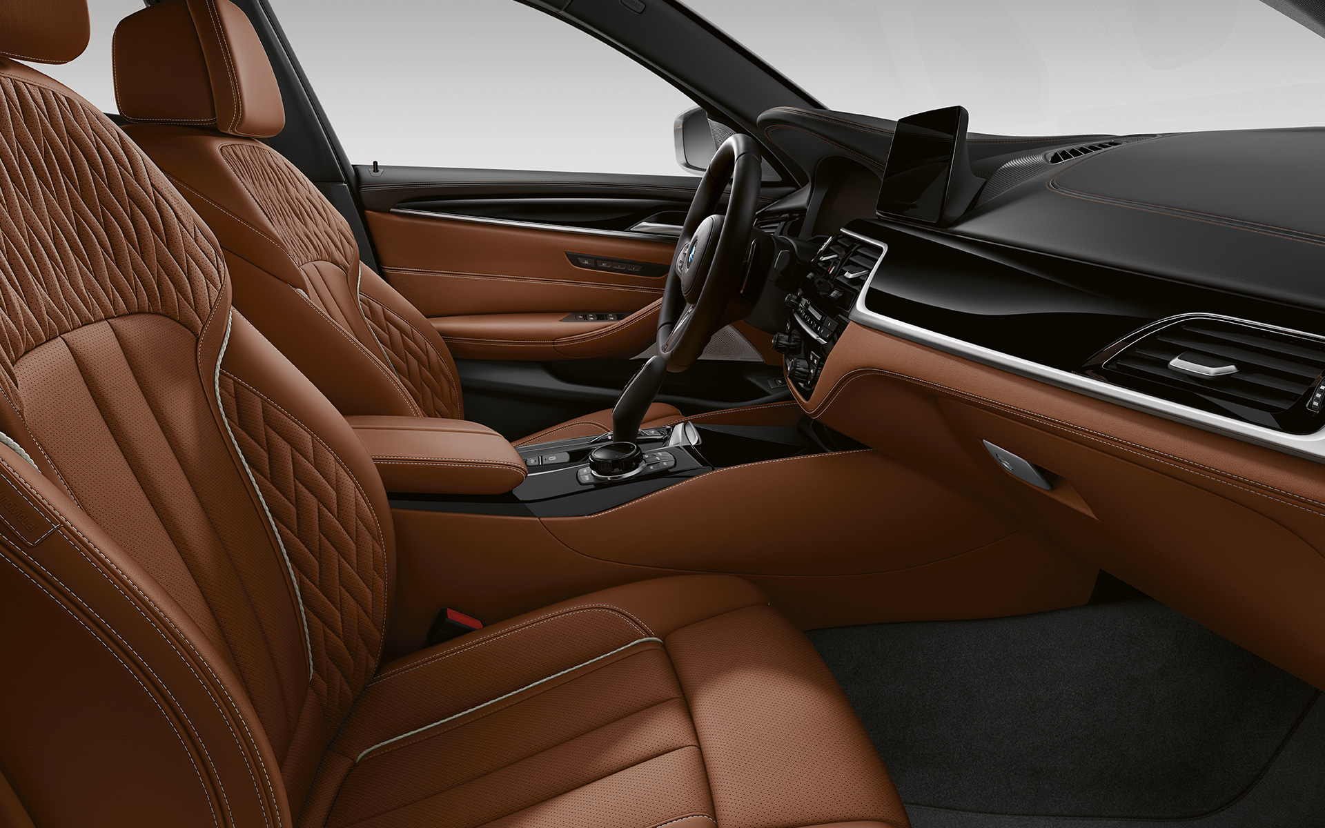 Imagine din interior a BMW Seria 5 Touring G31 LCI în piele integrală Merino BMW Individual – Tartufo Imagine din interior a BMW Seria 5 Touring G31 2020 Facelift în piele integrală Merino BMW Individual – Tartufo