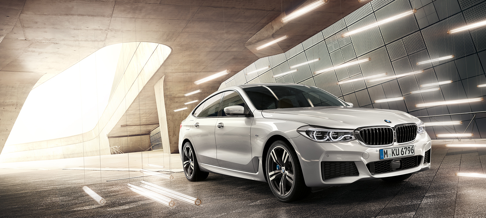 Imagine cu trei sferturi din partea frontală a BMW Seria 6 Gran Turismo, G32 Imagine cu trei sferturi din partea frontală a BMW Seria 6 Gran Turismo, G32, 2017, în Alb Mineral metalizat