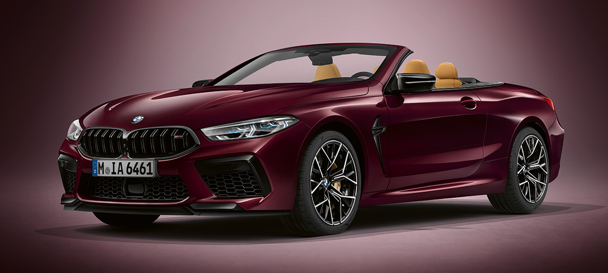 BMW Individual M8 Cabriolet în Ametrine metalizat de la BMW Individual. Imagine cu trei sferturi din partea frontală a BMW Individual M8 Cabriolet în Ametrine metalizat de la BMW Individual.