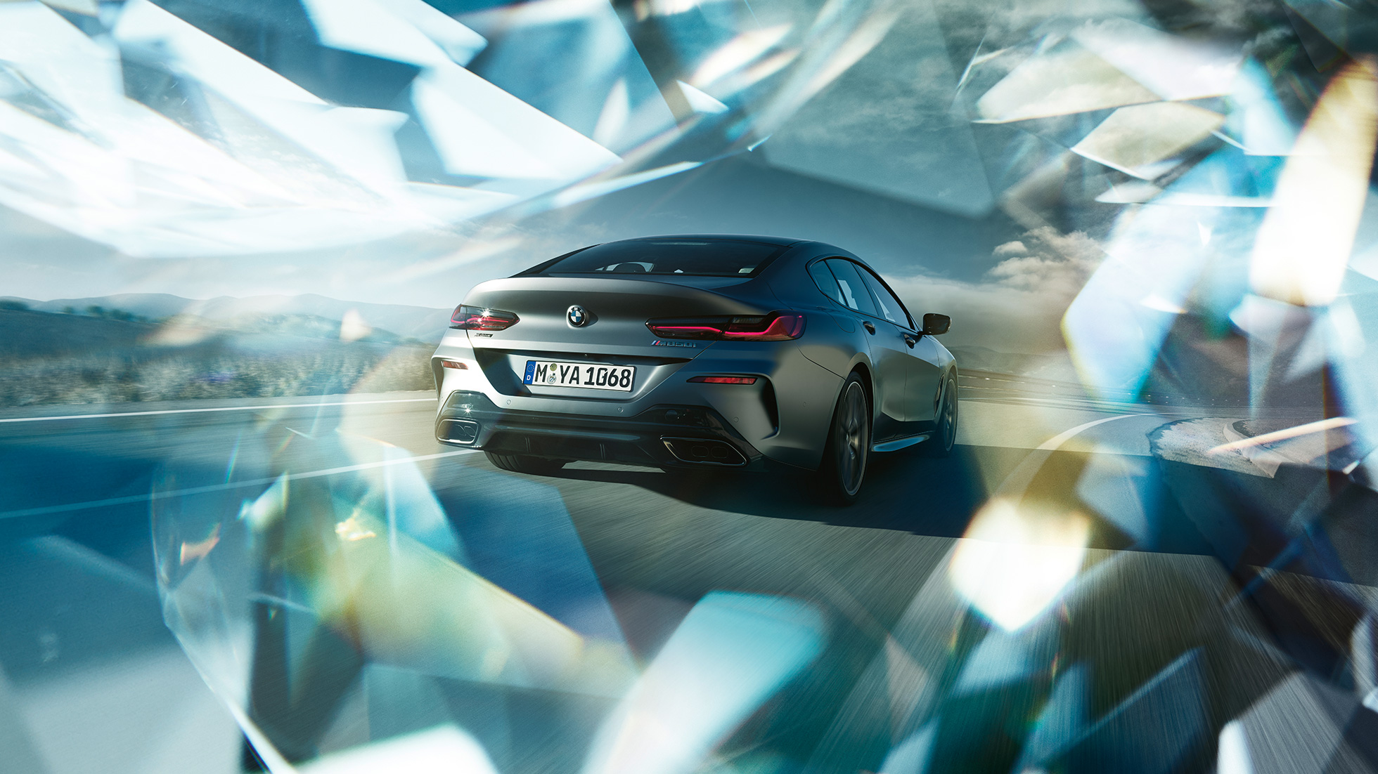 Imagine cu trei sferturi din partea spate a BMW M850i xDrive Gran Coupé Imagine cu trei sferturi din partea spate a BMW M850i xDrive Gran Coupé, G16, 2019, în Frozen Bluestone metalizat de la BMW Individual