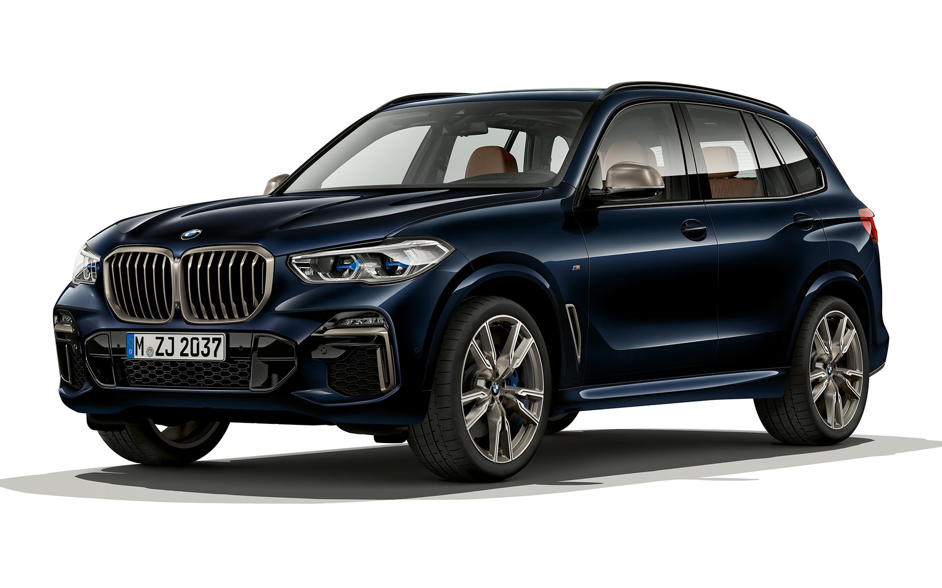 Partea faţă a BMW X5 M50d Imagine pe timp de noapte cu partea faţă a BMW X5 M50d