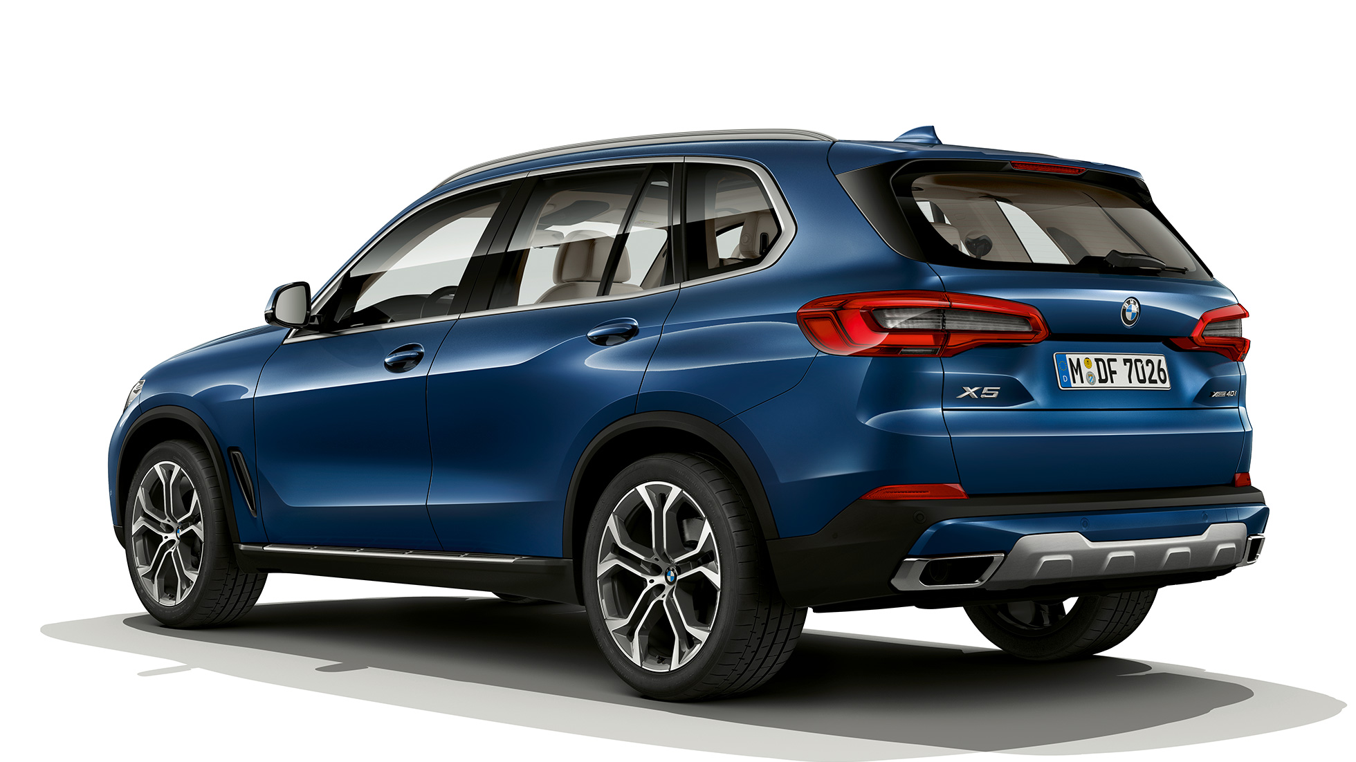 Imagine cu trei sferturi din partea spate a BMW X5 xDrive40i, Model xLine Imagine cu trei sferturi din partea spate a BMW X5 xDrive40i, G05, 2018, Model xLine, în Albastru Phytonic metalizat