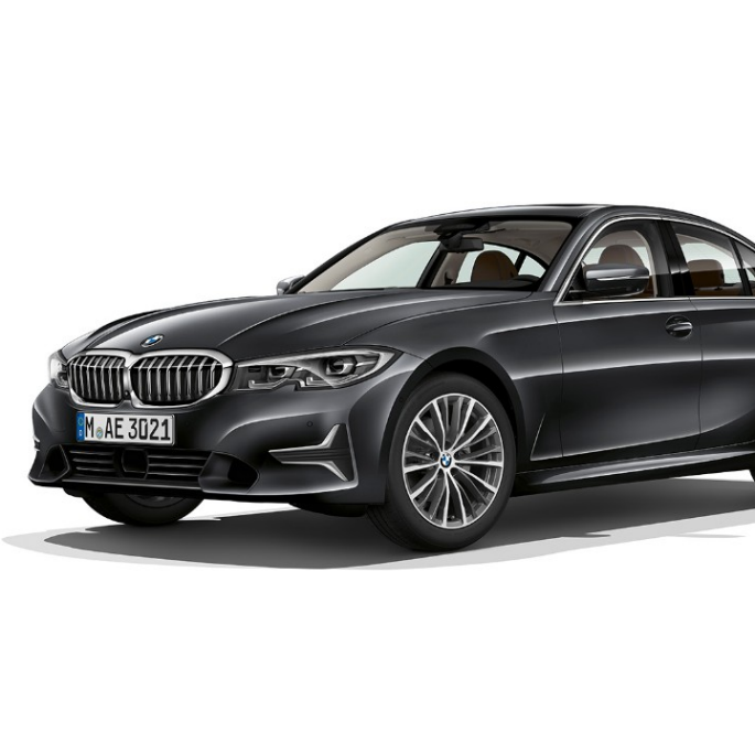 BMW Seria 3 Sedan model Luxury Line. Imagine din lateral cu BMW Seria 3 Sedan model Luxury Line staţionând.